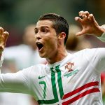 Ronaldo races off in celebration, honking some imaginary horns along the way